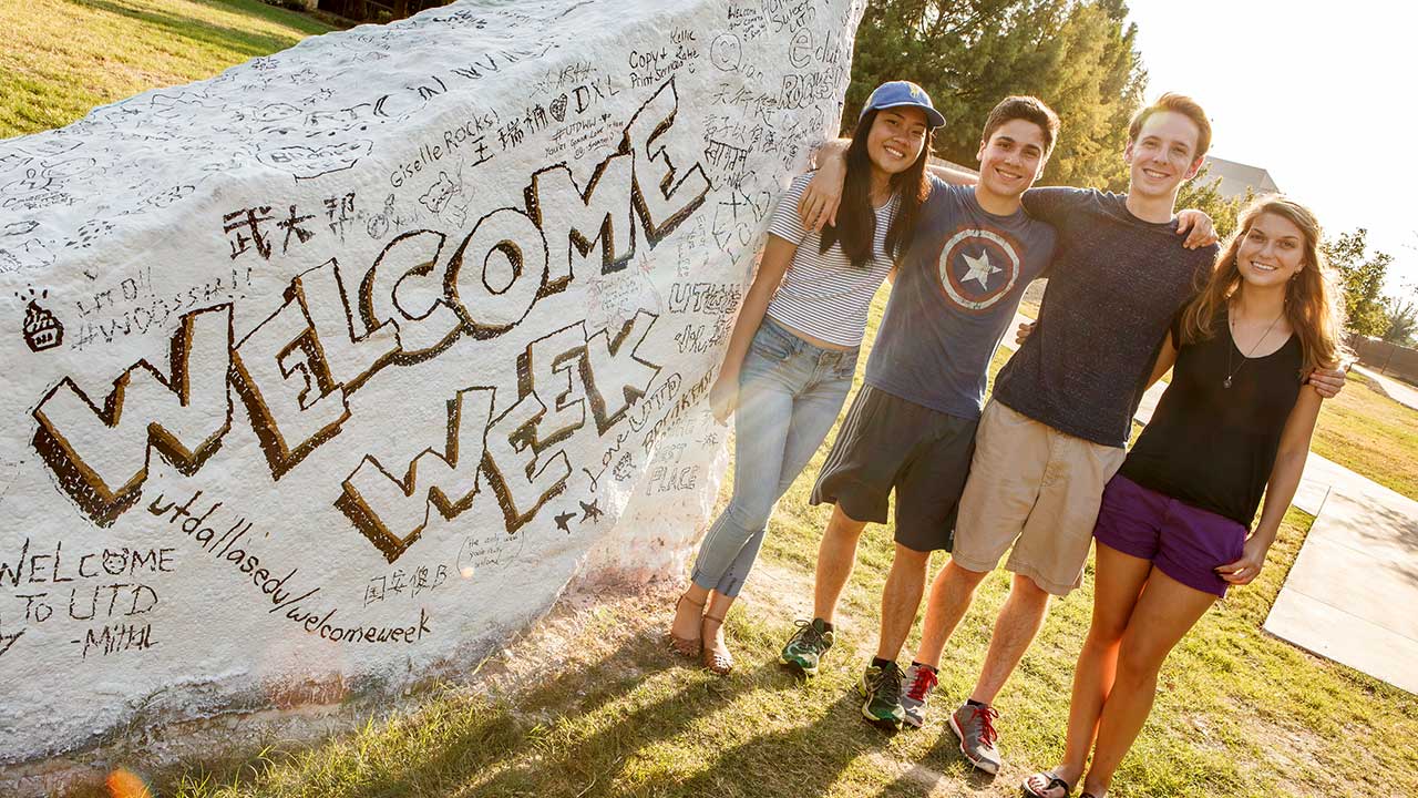 weeks of welcome with a group of students in front of spirit rocks 